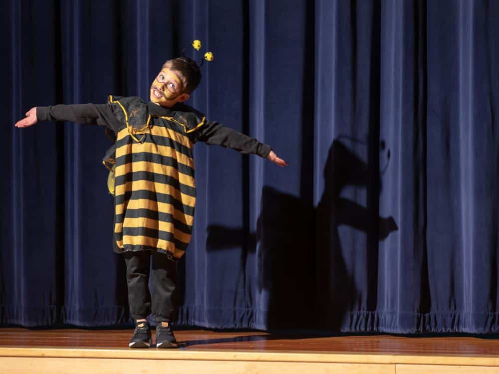 A student on stage
